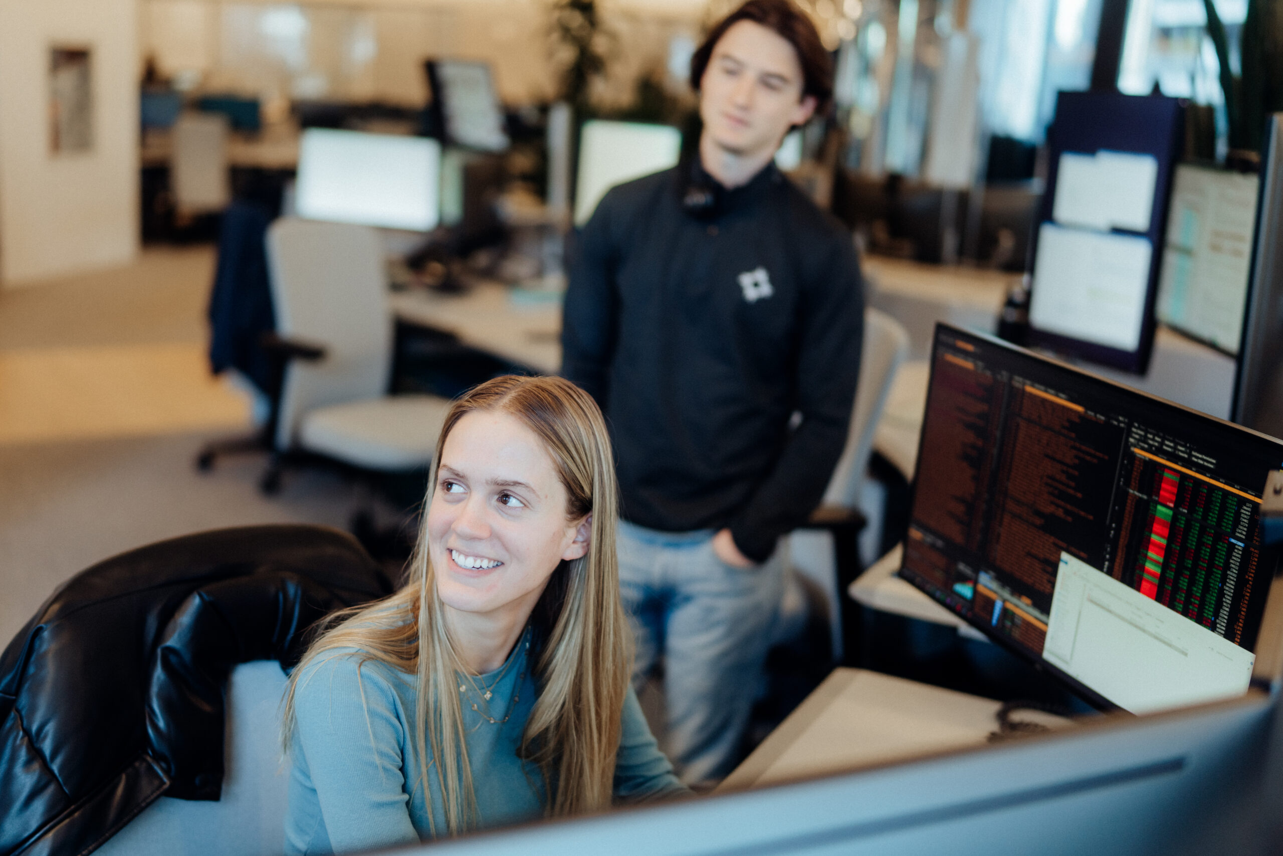 Academy analyst working at desktop computer